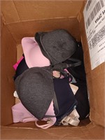 Box of 9 different bras, different sizes.