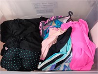 bin of bathing suit tops and cover ups