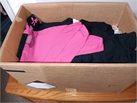 Box of women's clothes tops.