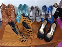 6 pair of women's size 8 heels shoes.