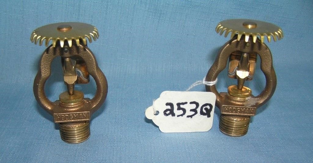 Vintage solid brass fire sprinkler heads dated 196