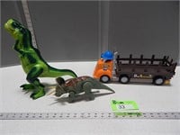 Toy dinosaurs and a Dino Transporter