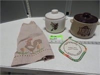 2 Bean pots, pot holder with advertising and an ap