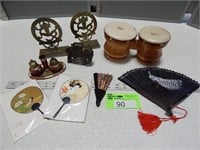 Cast iron coin bank, book ends, fans, drums and sa