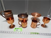 Copper dishes, cups and pitcher