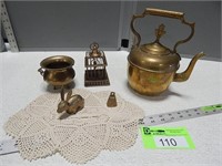Brass collection and a doily