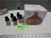 Ultrasonic aromatherapy diffuser; fragrance warmin