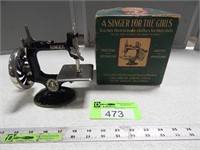 Toy Singer sewing machine with original box