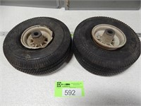 Pair of small tires on plastic rims; size: 4.10/3.
