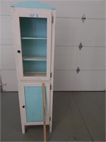 Antique cabinet; missing glass in top door; approx