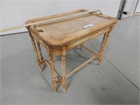 End table; top lifts off into a glass bottom tray