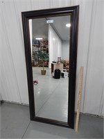 Framed wall mirror; 27" x 62"