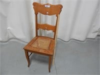 Antique caned seat chair; will need repair
