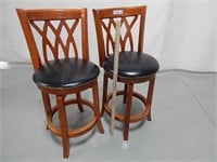 Swivel bar stools with padded seats; seat height: