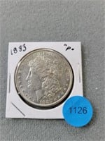 1883 Morgan dollar.   Buyer must confirm all curre
