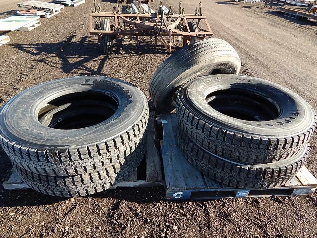 5 Semi truck tires; 4 are new retreads; size: 11R2