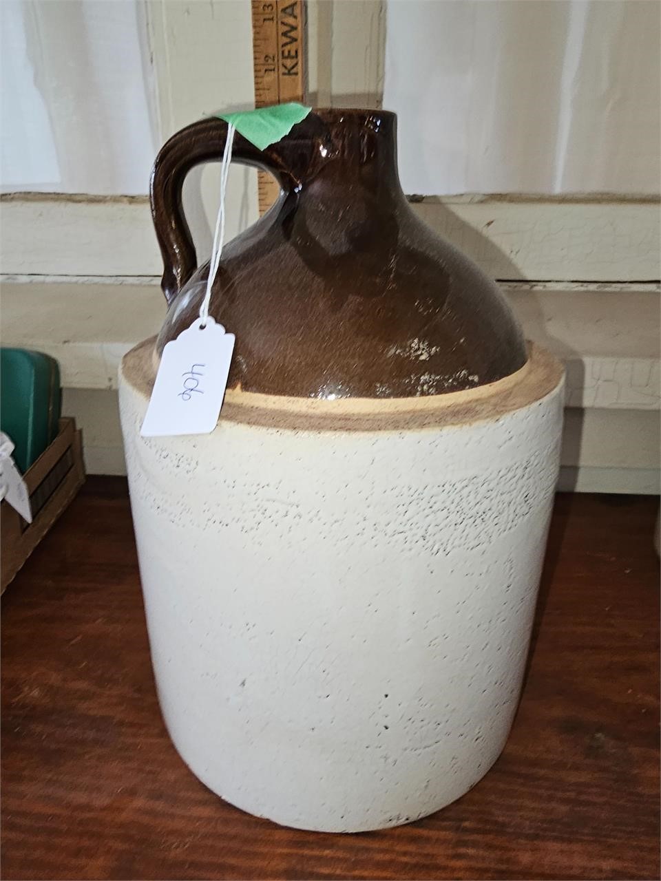 Brown and tan pottery jug no markings