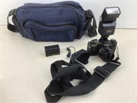 Ricoh 35 mm camera, battery & carry bag