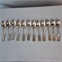 12 SPOONS MARKED COIN