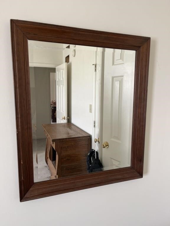 Wood framed mirror 28l by 24w