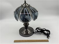 Small lamp with glass panels with a wolf scene