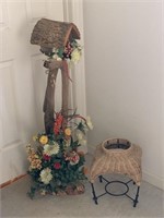 Birdhouse floral decor and wicker metal plant