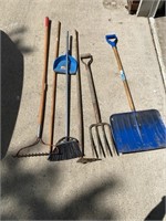 Gardening tools, snow shovel pole, and broom