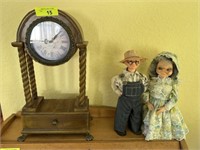 Clock & farmer & wife