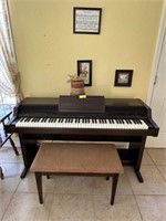 Roland Piano 5600 (electric), bench, candle, pict.