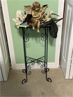 Plant stand, cherub, magnolia & "quilt" items on