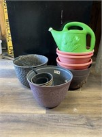 Assortment of plastic flower pots and a plastic