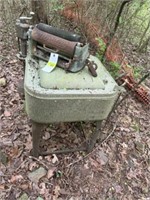 Old Antique Maytag washer in woods (you will need