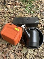 Empty saw case and toolbox, water can, bowl