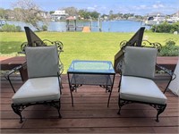 Vintage cast iron chairs and table