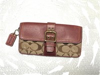 Coach red leather wallet w/ front buckle