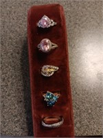 5 very nice costume jewelry rings.