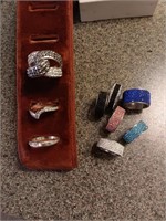 9 costume jewelry rings.
