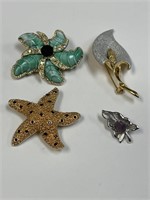 LOT OF 4 BROOCHES ONE SIGNED SAL