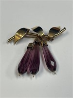 GOLD TONE BROOCH WITH PURPLE GLASS BEADS