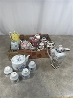 Porcelain tea set, pitchers, vases, and other tea