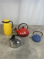 Assortment of metal teapots and cast iron small