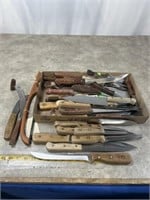 Large assortment of wood handle kitchen knives