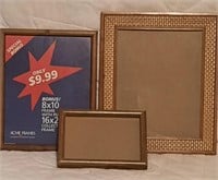E5) 3 picture frames 2 are 8 x 10 5x7.Clean frames