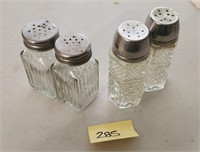 2 sets of salt and pepper shakers  clear glass