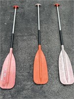 Three canoe/kayaking paddles