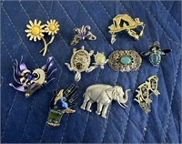 LOT OF SIGNED AND DESIGNER BROOCHES