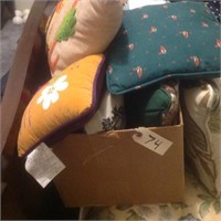 box of assorted pillows