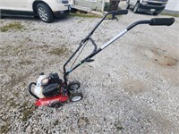 Southland  2 cycle 43 cc  8" tiller like new.