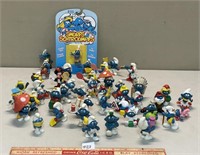 FUN LARGE LOT OF VINTAGE SMURFS AND A SEALED SMURF