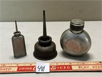 NEAT ANTIQUE OIL CANS